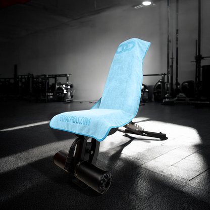 Multi-functional hooded gym towel covering a bench, showcasing its premium quality and anti-fall design in a gym setting.